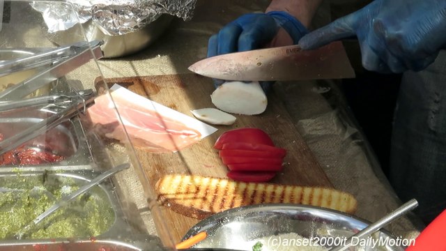 London Street Food. Preparing an Italian Bruschetta. Seen in Southbank