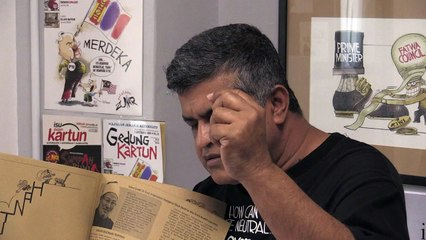 Malaysian cartoonist defiant 'to the last drop of my ink'