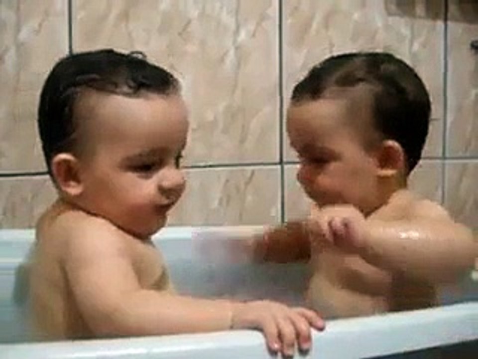 Twins Brothers Enjoying Bath Time