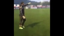 Besiktas goalkeeper Günay Güvenç scores from an impossible angle in training