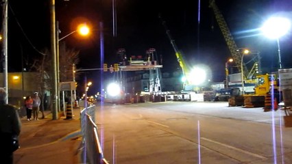 Construction and Remainder of the Tunnel boring machine being lowered into the launch shaft - Saturday April 18, 2015.