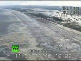 Japan Earthquake: Helicopter aerial view video of giant tsunami waves
