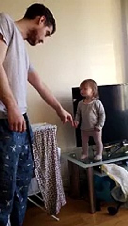 Adorable daddy daughter standoff