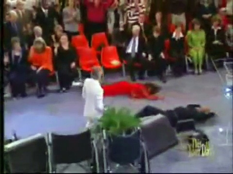 Benny Hinn goes down off the platform and anoints crowd