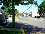 MANY TELEPHONE AND ELECTRIC POLES CASCADE TO GROUND