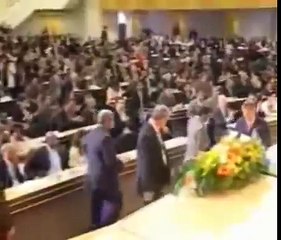 crazy clown is interrupting Mahmoud Ahmadinejad's speech at UN-conference in Geneva