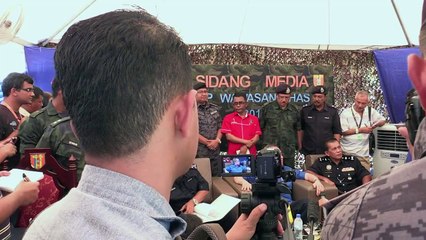 Malaysia defends failure to discover 'migrant camps' at border