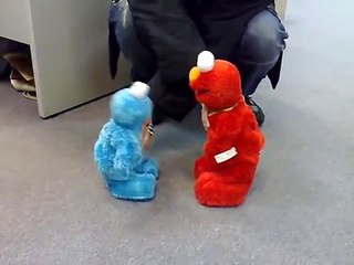 My Tickle Me Elmo and Tickle Me Cookie Monster at work~