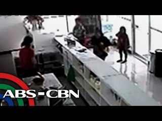 Mag-iina, kita sa CCTV habang 'sumasalisi' sa tindahan