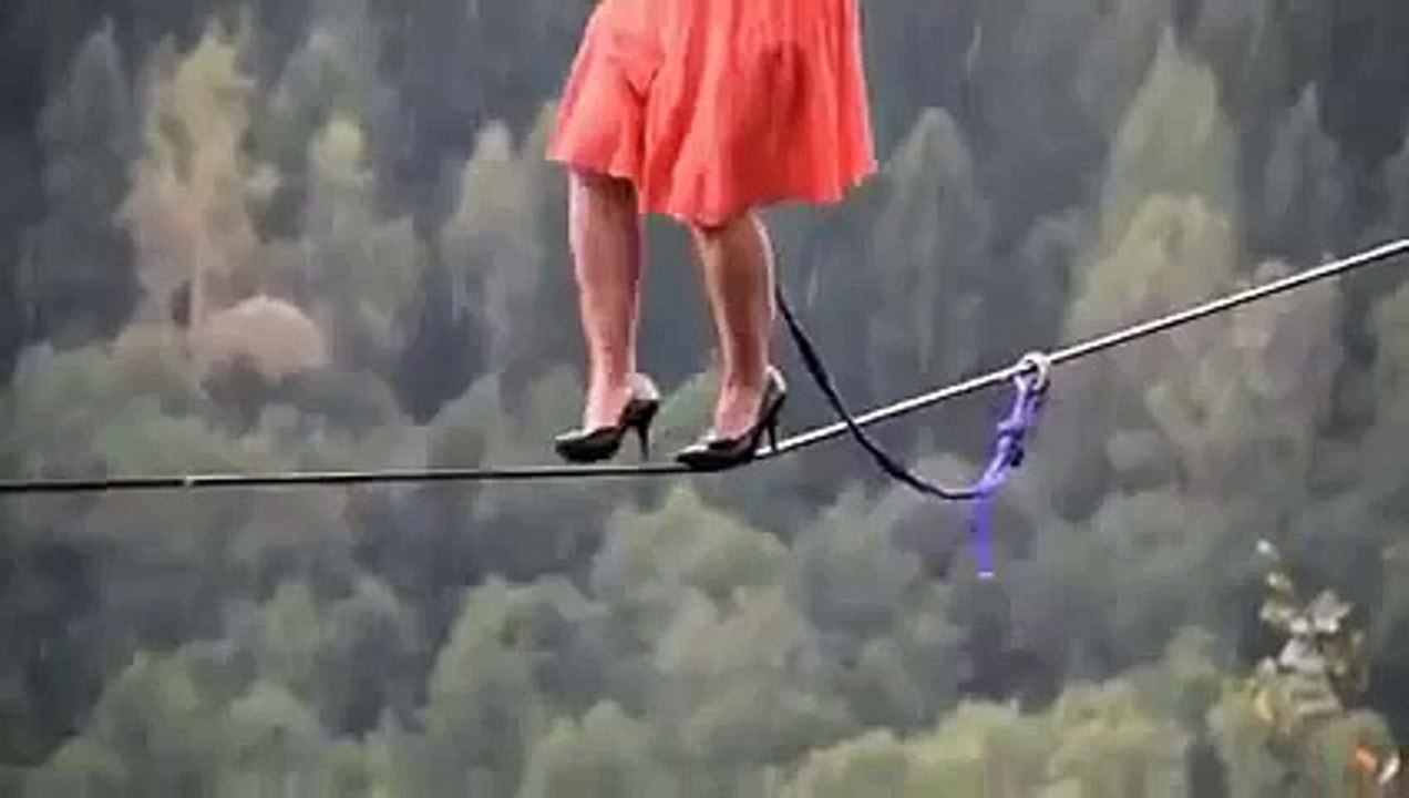 Girl Walking Over Rope With Heels.