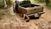 HOT CHICK FALLS IN MUD WHILE PULLING OUT CHEVY 4X4 MUD TRUCK FAIL - Red River Mud Bog