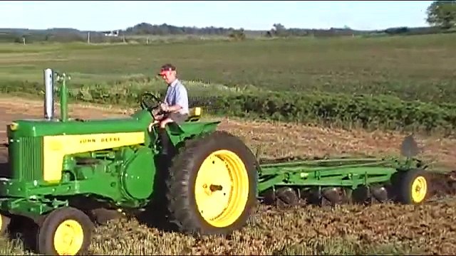 John Deere 530 and 730 plowing