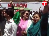 TI and MQM workers face-off at Azizabad polling station as PTI leader Nazia Rabani arrives to cast her vote