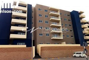 Spacious 1 Bedroom Apartment in Al Reef Downtown with Modern Open Kitchen with Dark Brown Cabinets  Very Spacious      .