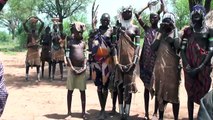 Mursi people - native African tribes in the Omo valley in South of Ethiopia
