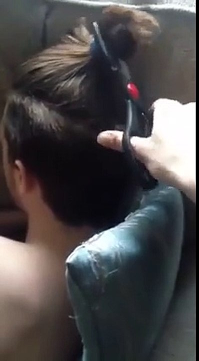 Brother cuts sister hairs while sleeping