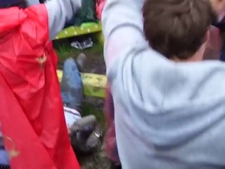 Drunk guy builds up a crowd at Glastonbury