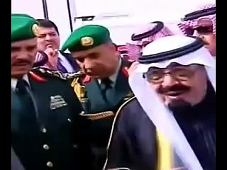 El rey Abdula de Arabia Saudí y su escolta personal