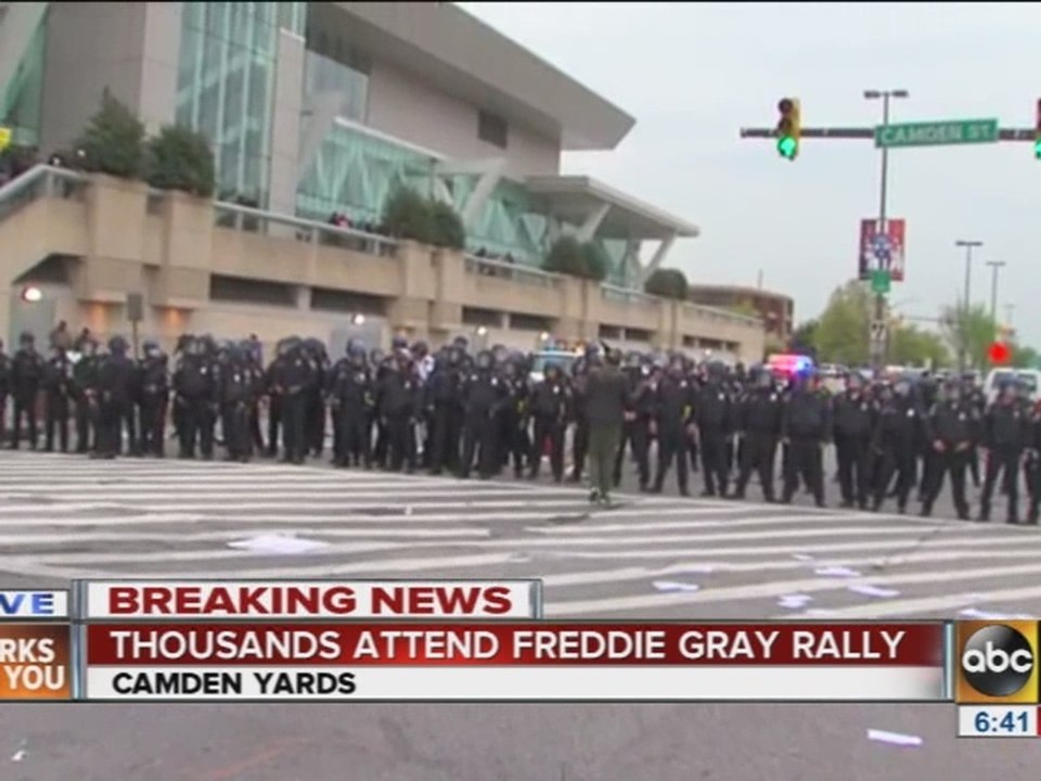 Police hold the line at Camden Yards against instigators, rallying for Freddie Gray