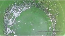 Massive  MERCURY-FILLED Water Balloon - Popped  (slow motion Hg)