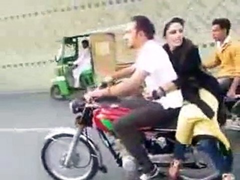 pakistani-boy-wheeling-on-bike-with-Girl-Friend
