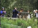 GRIZZLY BEAR CHASES FISHERMEN - THEY FIGHT BACK!