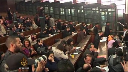 Al Jazeera journalists return to Cairo court