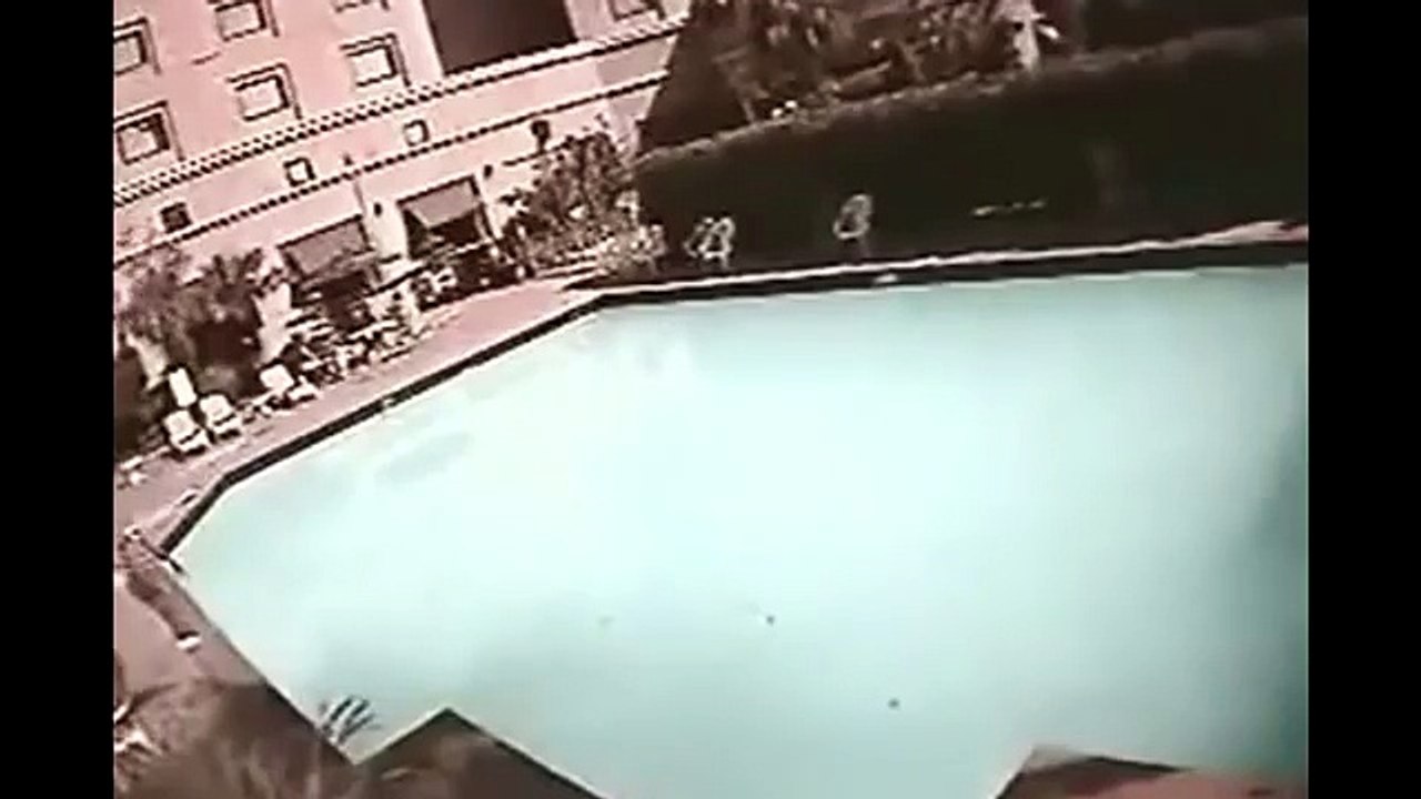 NEPAL EARTH QUAKE - SWIMMING POOL ROCKED TERRIFICALY