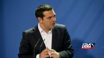 Tsipras, Merkel discuss Greek debt