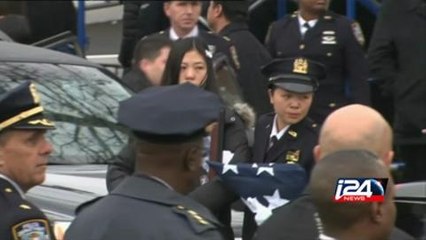 NY police turns backs on mayor at funeral for slain officer