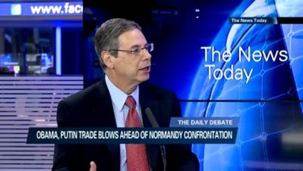 Obama, Putin trade blows ahead of Normandy confrontation