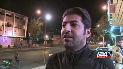 العراقيون يحتفلون برفع حظر التجول بالاعلام وابواق السيارات