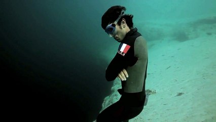 Guillaume Nery base jumping at Dean's Blue Hole (Trentemøller Edit)