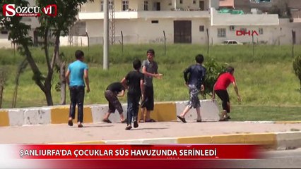Şanlıurfa'da çocuklar süs havuzlarında serinliyor