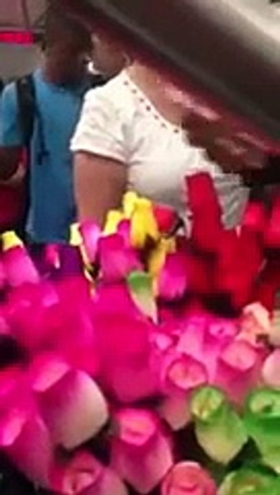 Man Makes the Day of Flower Selling Women