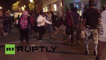 Peleas y disturbios durante el toque de queda en Baltimore