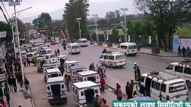 Nepal earthquake: CCTV shows archway collapsing onto road