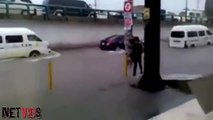 Man Tries To Carry His Girlfriend Through Rain _ Fail!