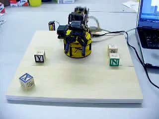 Lynx 6 Robot Arm spelling with blocks vertically