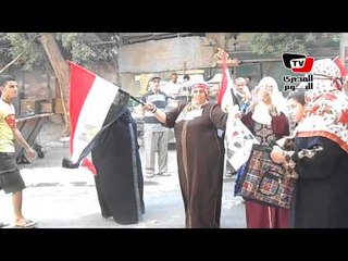 رقص وغناء و زغاريد في لجنة انتخابية بالعمرانية