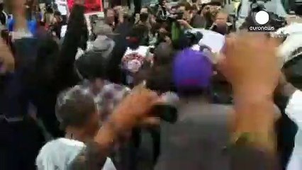 Балтимор: полицейским предъявят обвинения в убийстве Фредди Грэя