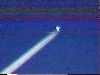 UFO FLYING SAUCER IN VAPOR TRAIL not reflection , REAL ufo DAY TIME