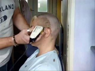 C Having her head shaved !!