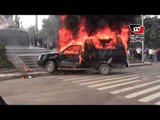 حرق سيارة شرطة أمام جامعة القاهرة احتجاجا على مقتل طالب هندسة