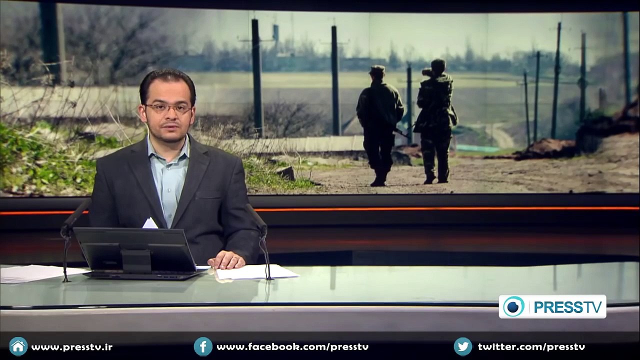 Fresh fighting rages on in eastern Ukraine despite ceasefire deal