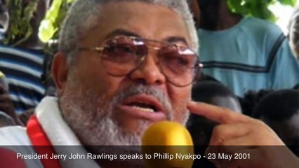 President Jerry John Rawlings speaks to Phillip Nyakpo