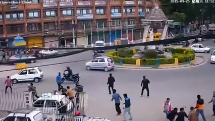Security camera video shows monument toppled as Nepal quake strikes