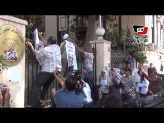 مؤيدو مرسي يضعون صورته على بوابة «القومي لحقوق الإنسان»