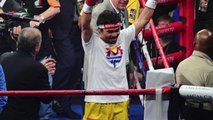 Floyd Mayweather defeats Manny Pacquiao