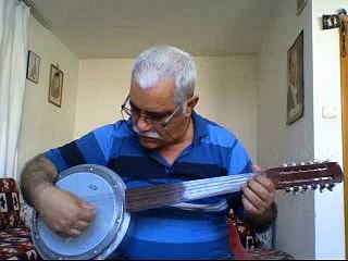 Mut'lu Fikri Demir.MUT TÜRKÜSÜ=- Goram Şahı-Cümbüşle - amatör videom.söz müzik=Anonim